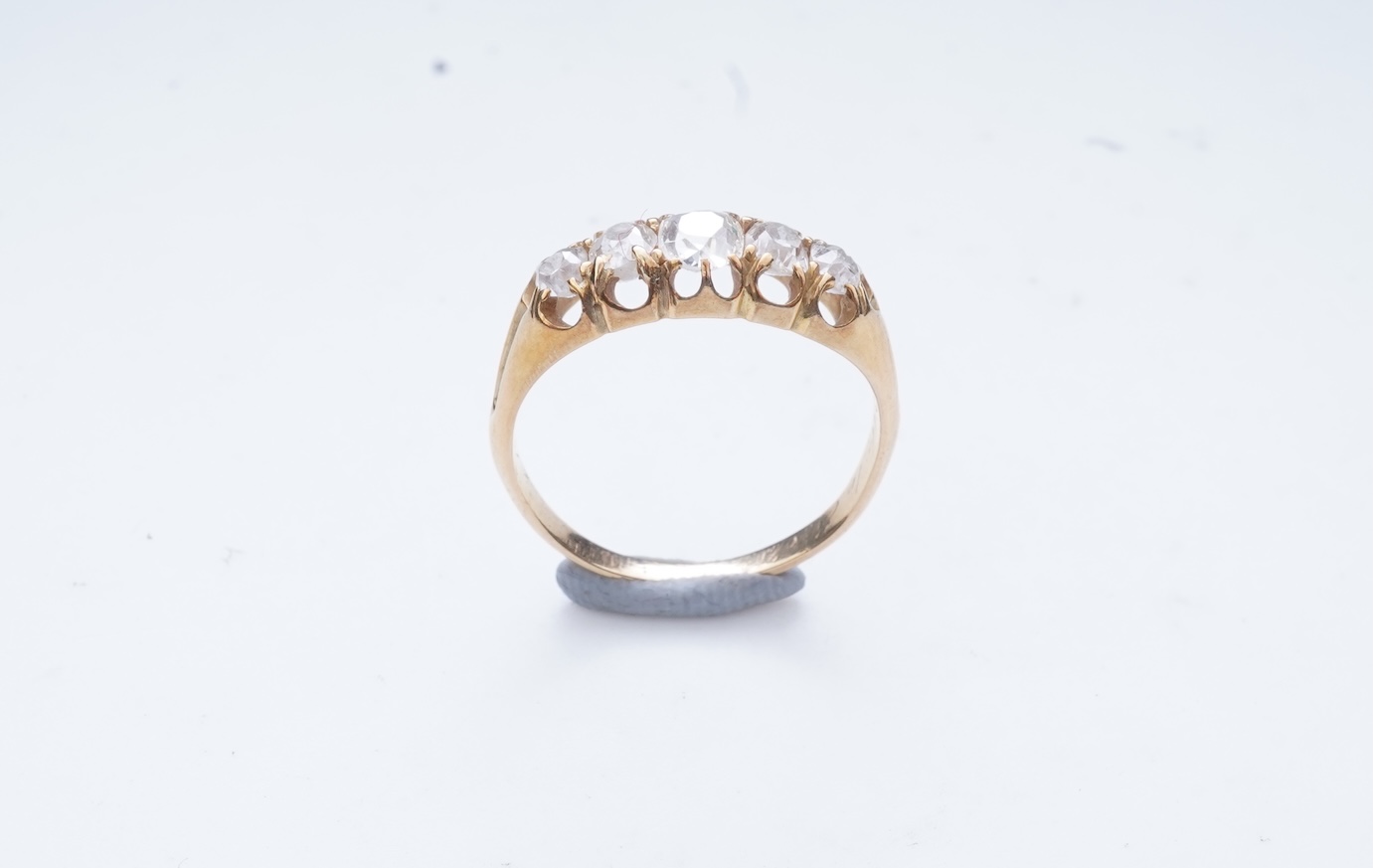 A Victorian five-stone diamond ring, late 19th century